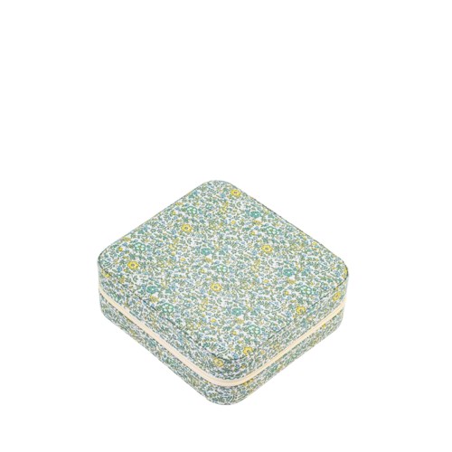 En liten låda med blommönster, mest blå och gula, med rundade kanter och en vit linje i mitten.