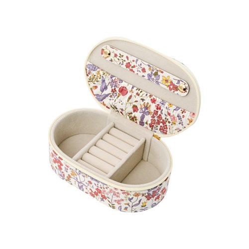 A floral-patterned jewelry box with an open lid, showing compartments for rings and small items.