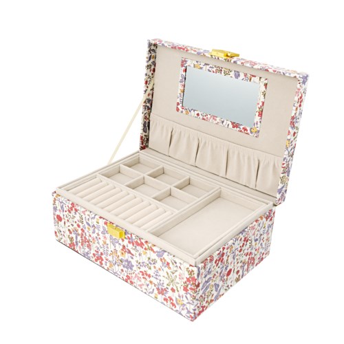 A floral-patterned jewelry box with compartments for rings and necklaces, featuring a mirror inside the lid.