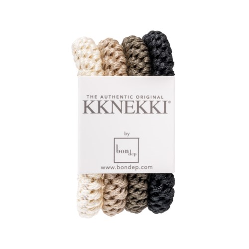 Six thick, knitted ropes in cream, beige, brown, and black, held together with a white label. The label has text and a website.