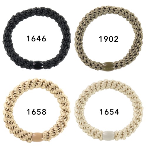 Four woven bracelets in black, green, beige, and off-white, each with a unique year and a smooth clasp.