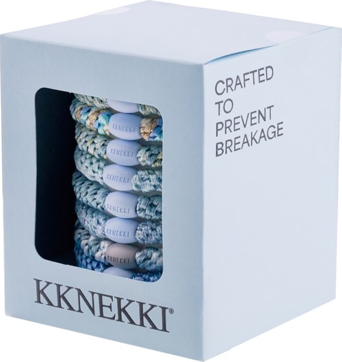 A box contains multi-colored braided jewelry with text that says crafted to prevent breakage.