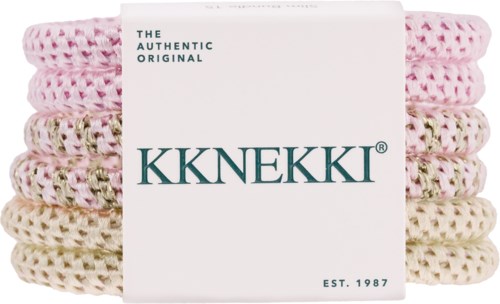 A set of knitted headbands in pink, white, and cream colors, with a label showing the brand KKNEKKI.