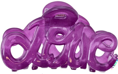 A purple plastic sculpture spells the word "love" in a playful, flowing style.