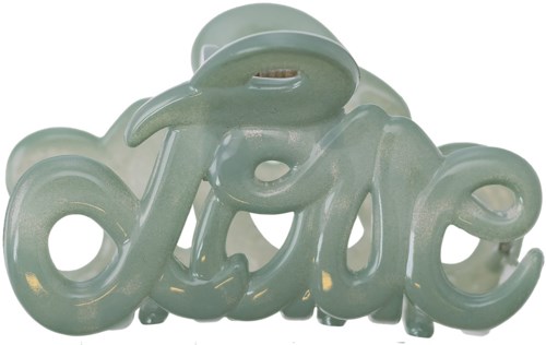 A jade-colored sculpture spelling the word "Love" in a stylish, cursive font.