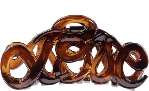 A hair clip shaped as the word 'love' in brown, shiny plastic material.