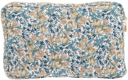 A floral patterned fabric with blue, beige, and peach colors, showing leaves and small flowers.