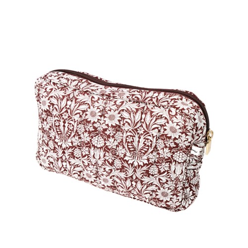 A rectangular cosmetic bag with a floral pattern in red and white, gold zipper on top.