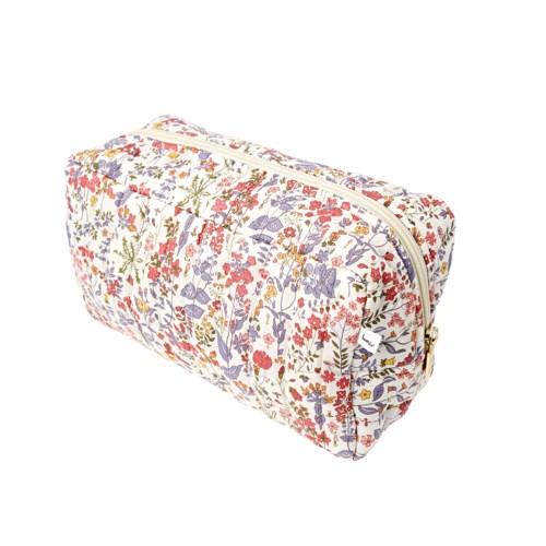 A rectangular floral fabric toiletry bag with a zipper closure and a small white logo on the side.
