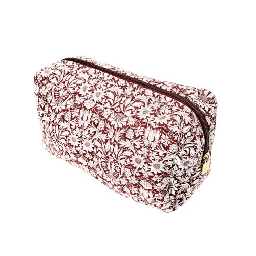 A floral patterned cosmetic bag with a zipper, primarily in red and white colors.