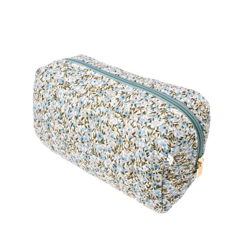 A floral patterned zippered cosmetic bag with a gold zipper pull. It is oval-shaped and designed for personal items.