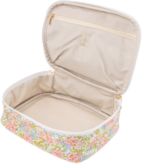 A floral patterned bag with an open main compartment and an inside zip pocket.