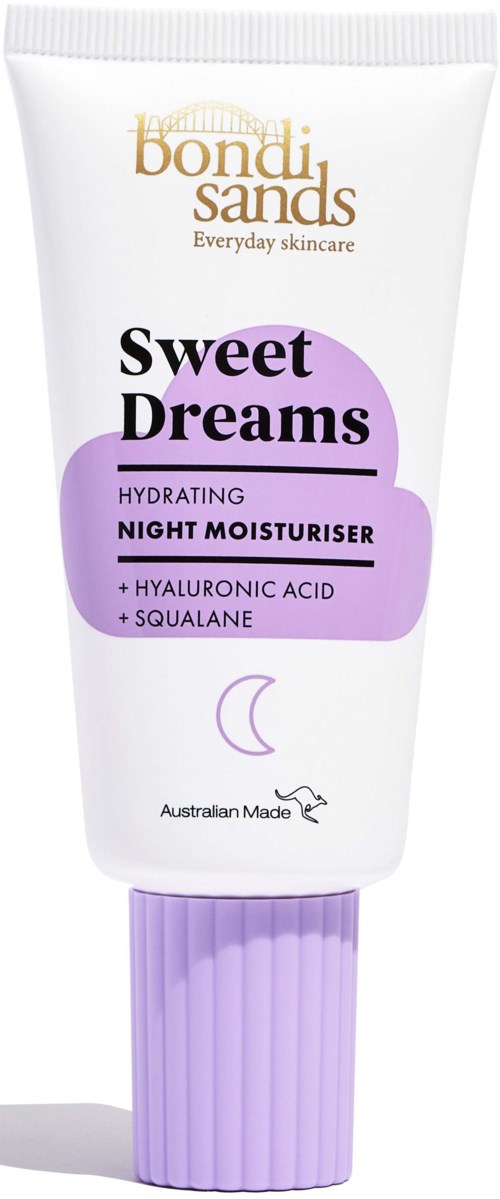 Valkoinen puteli yövoiteelle, lila korkki, nimeltä "Sweet Dreams" Bondi Sands, kosteutukseen ja ihonhoitoon.