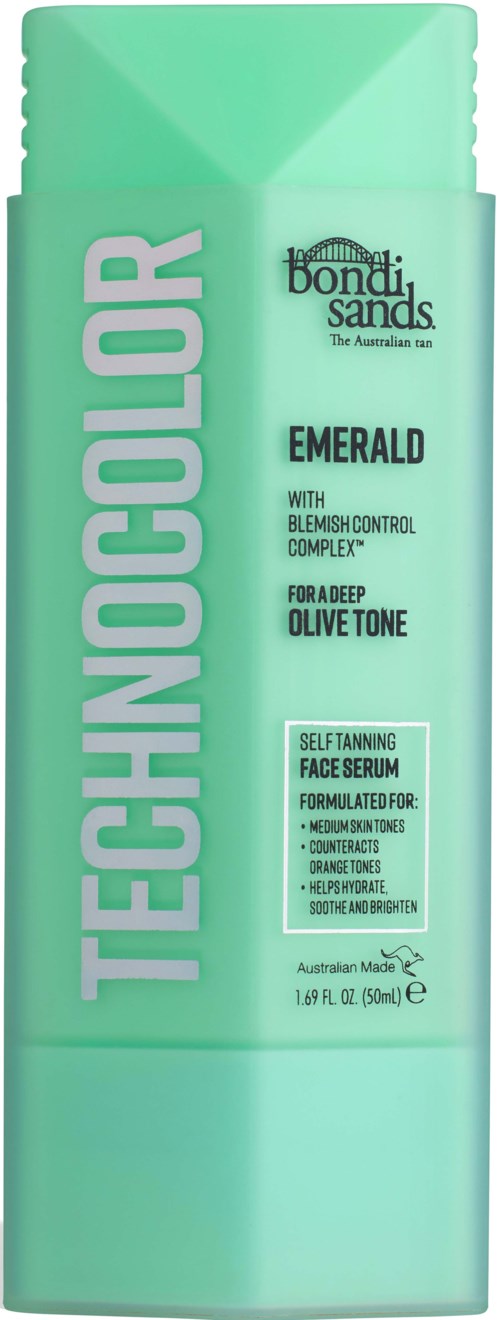 A green bottle labeled 'Technocolor' with 'Emerald' for deep olive skin tone, featuring blemish control and face serum.