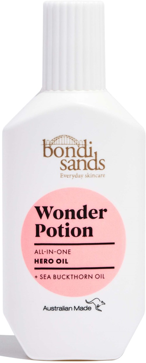 A white bottle with a pink label reads 'Wonder Potion' and mentions hero oil and sea buckthorn oil.