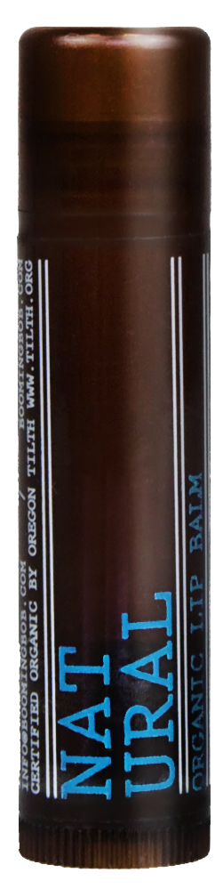 Ein brauner Behälter mit der Aufschrift 'NAGURAL' und 'LIP BALM' in blauer Schrift, steht aufrecht.