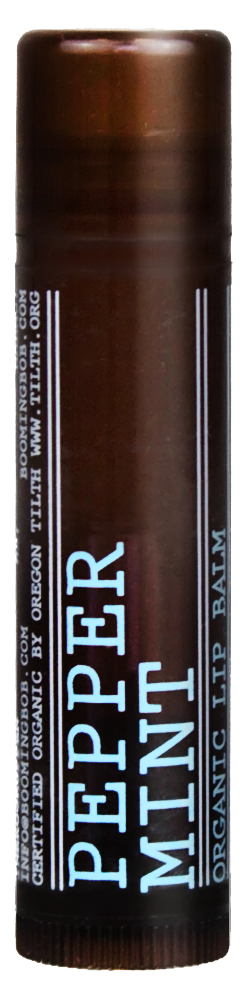 Braune Lippenpflegestift mit blauer und weißer Beschriftung, bezeichnet 'PEPPER MINT' und 'ORGANIC TINTB PALL'.