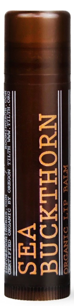 A brown cylindrical lip balm tube with gold and white text, labeled as Sea Buckthorn Organic Lip Balm.