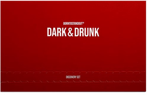 Rood doos met witte tekst: 'BornToStandOut DARK & DRUNK Discovery Set'.