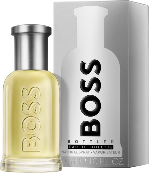 Boss Bottled Eau de Toilette Parfümflasche mit silberner Kappe und weißer Verpackungsschachtel. Die Flasche ist mit gelber Flüssigkeit gefüllt.