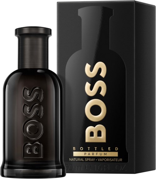 Een zwart parfumflesje met 'BOSS' erop, naast een zwarte doos met dezelfde branding.