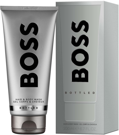 Een BOSS-merk haar- en bodywash in een zilveren tube met zwarte tekst, in een bijpassende doos.