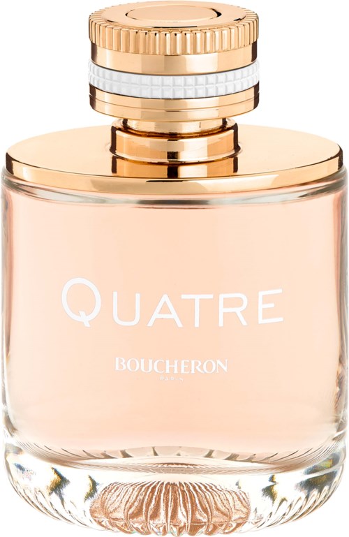 A perfume bottle with a rounded glass body, gold and white cap, and the words 'QUATRE BOUCHERON' on it.