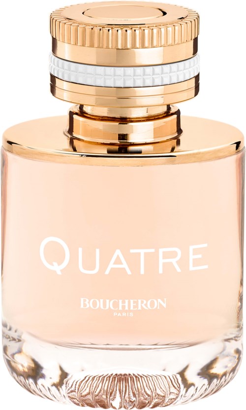 Ein Parfümflasche mit roségoldenem Deckel, markiert 'QUATRE' von Boucheron, klares Glas, elegantes Design.