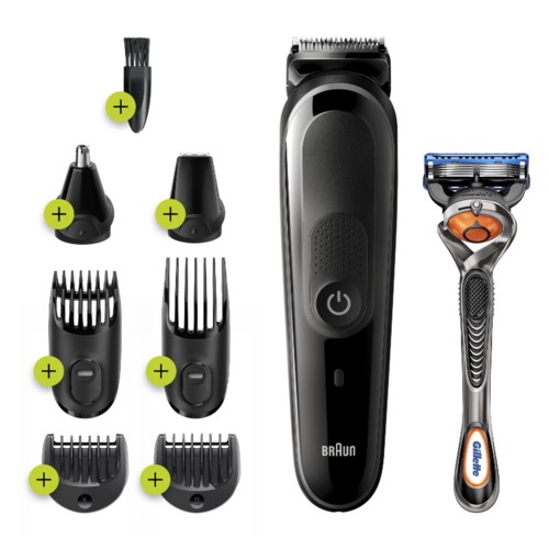 Ein Haarschneiderset mit verschiedenen Aufsätzen, einen Trimmer in der Mitte und einen Rasierer rechts.