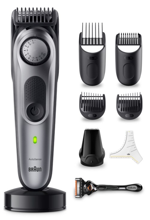 A grooming kit includes an electric trimmer, four adjustable attachments, a cleaning brush, a stand, and a guard. 
