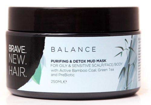 Ein Behälter mit Balancing Purifying & Detox Mud Mask für fettige und empfindliche Haut mit Bambuskohle und grünem Tee.