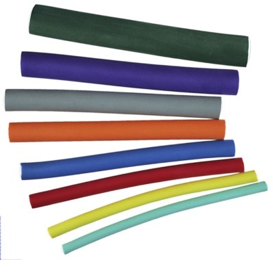 Colorful chalk sticks in green, blue, purple, gray, orange, red, yellow, and light blue stacked together.