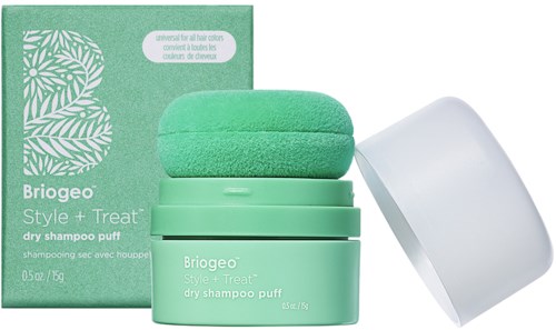 Een groene doos met een spons erop en een witte deksel. De doos en container hebben productinformatie.
