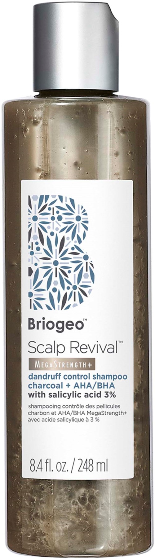 Doorzichtige plastic fles met zilveren deksel, label 'Briogeo Scalp Revival' voor schilferremmende shampoo met houtskool.