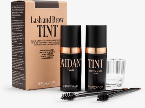 A lash and brow tint kit with two bottles, applicator tools, and a box, designed for beauty enhancement.