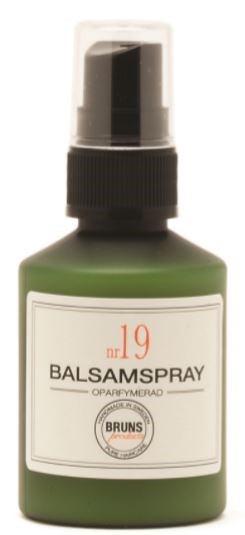 Grön flaska med svart och genomskinlig spraytop, märkt 'BALSAMS spray, nummer 19' och en logga längst ner.
