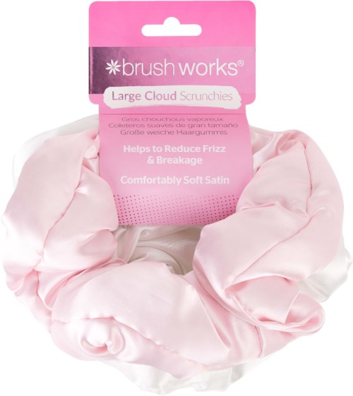 Pink satin hair scrunchie with a cardboard label that says 'Brush Works Large Cloud Scrunchies'.