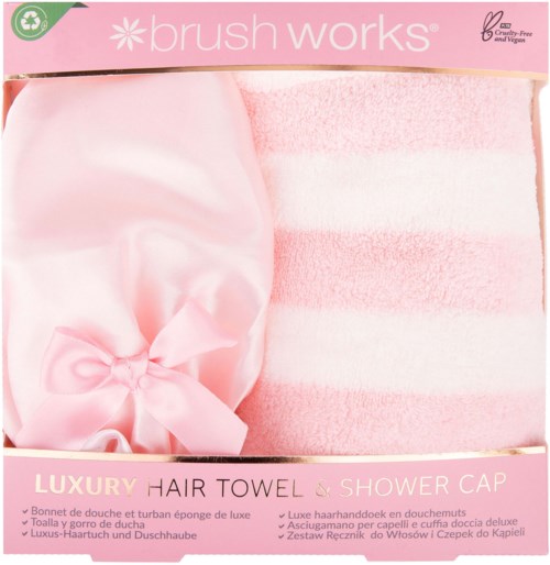 A pink gift set includes a shower cap, a satin bag, and a pink and white striped towel.