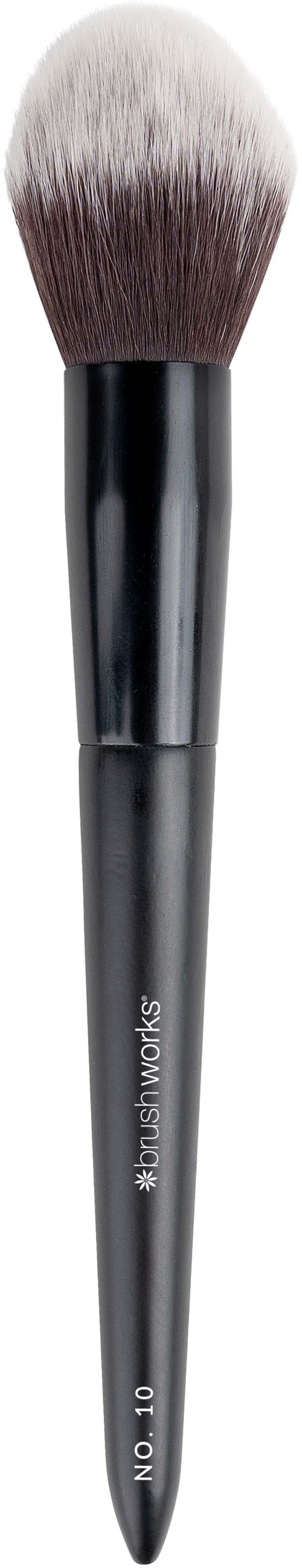 A large makeup brush with black handle and fluffy white and brown bristles.