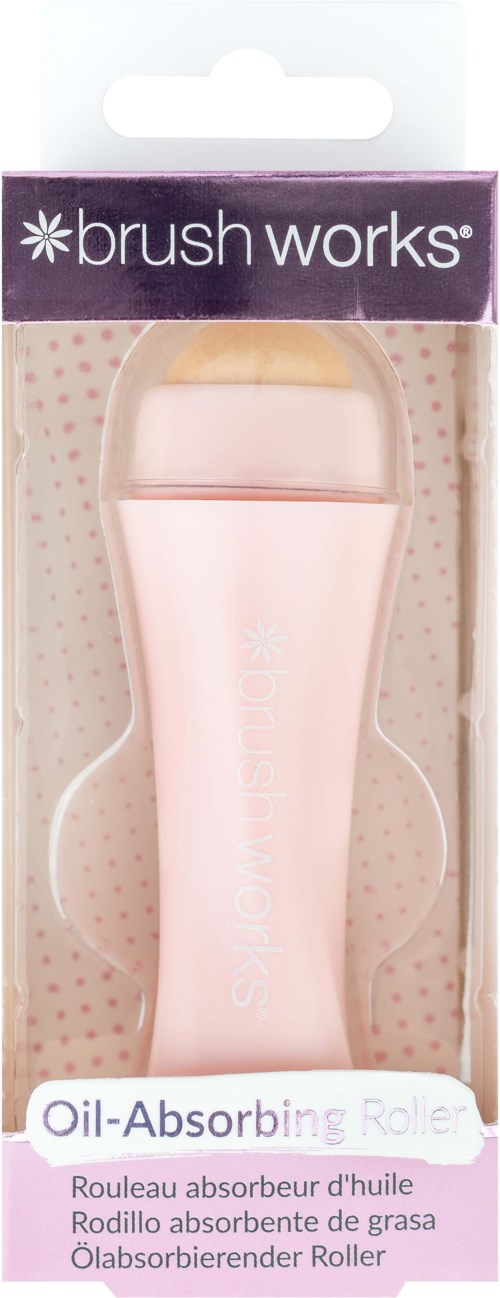 Pink oil-absorbing roller in packaging, designed to reduce oil on skin with a rolling motion.