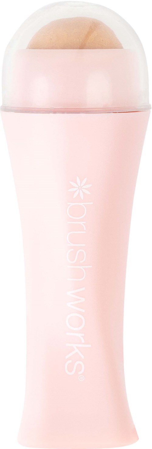 A pink makeupbrush cleaner with a rounded, soft brush at the top, and the words "blush works" on the handle.
