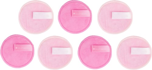 Eight round, pink and white patches, likely for skin or medical use, arranged in two rows.