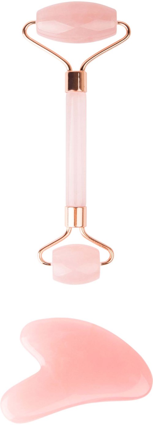 A pink facial roller with two stones and a small amount of pink serum or gel underneath.