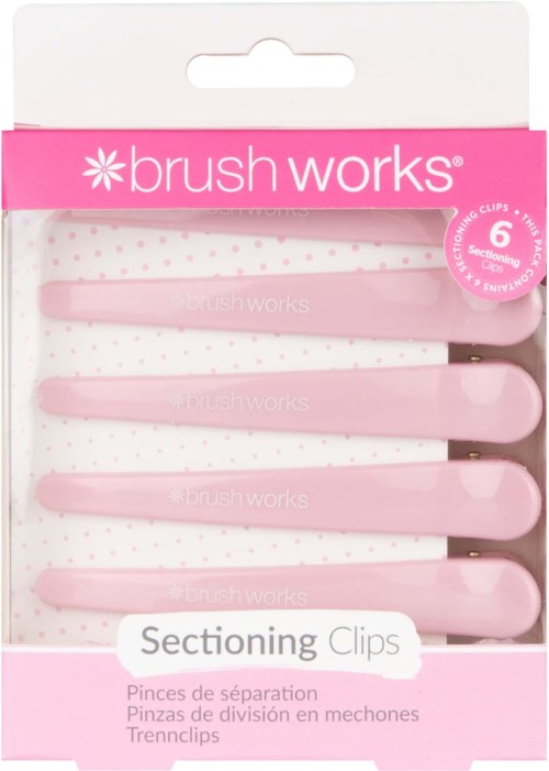 A pack of pink sectioning clips with six clips for hair, labeled 'brush works' on a white background with pink accents.