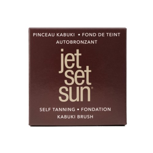 Een bruin doosje met merknaam Jet Set Sun, beschrijft zelfbruinende foundation en kabuki borsteltje.