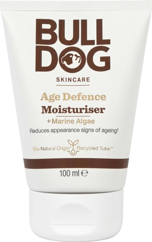 Eine weiße Tube mit BULLDOG Skincare Feuchtigkeitscreme, brauner und goldener Text, betont Alterschutz und Meeresalgen.