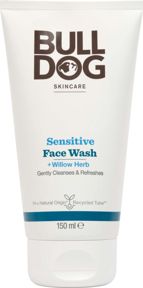 A white tube with black and blue text, labeled as face wash with willow herb for sensitive skin.