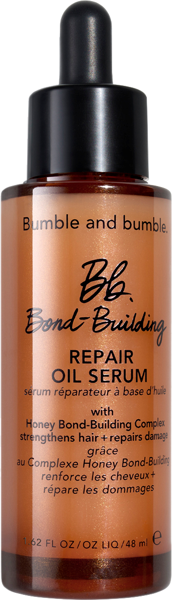 Bumble and Bumble Repair Oil Serum in kleiner brauner Flasche mit schwarzem Tropfer.