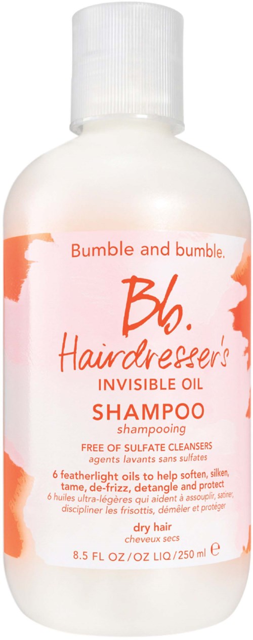 Eine weiße Flasche mit einem Etikett, das Bumble and Bumble Hairdresser's Invisible Oil Shampoo für trockenes Haar, 8,5 fl oz, sagt.