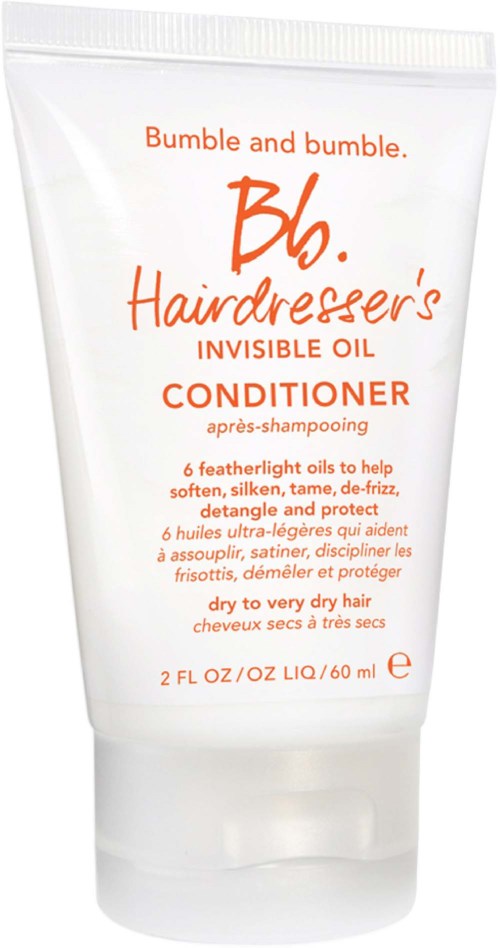 Eine weiße Tube mit Bumble and bumble Conditioner mit orangem Text für sehr trockenes Haar.